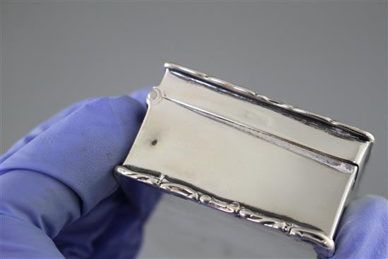 An Edwardian silver and enamelled cabochon set rectangular box and hinged cover, the enamel decorated with the bust of a lady